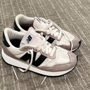 New Balance Cream and Black Sneakers